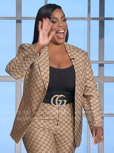 Niecy Nash’s Gucci print suit and belt on The Talk 